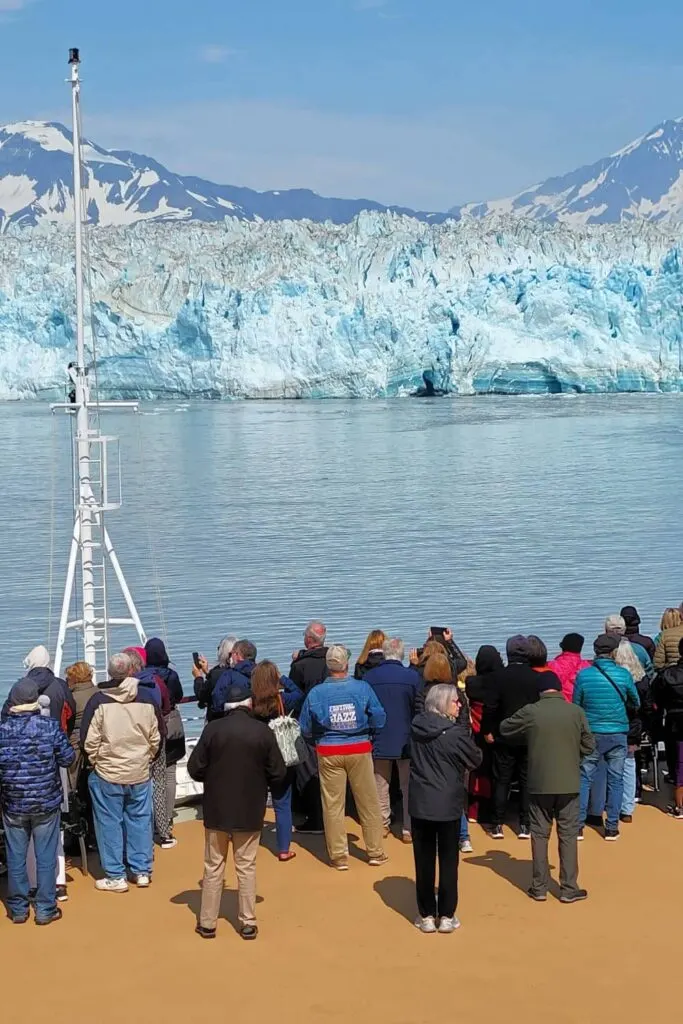 Guests dressed for the cold at Hubbard Glacier in July