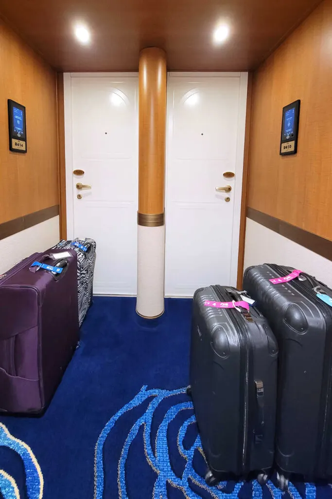 Luggage outside the stateroom door