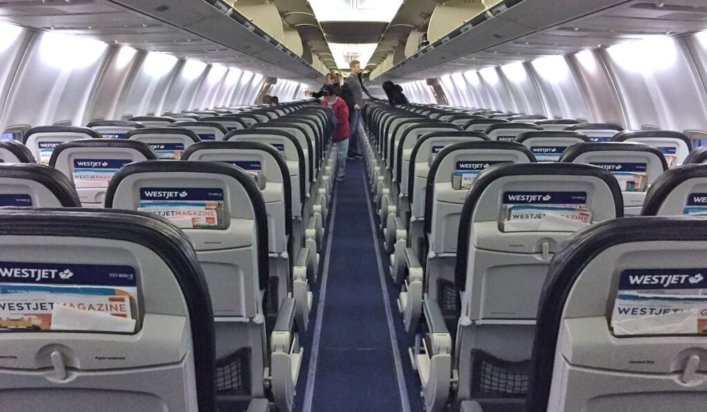 WestJet aisle with three seats on each side