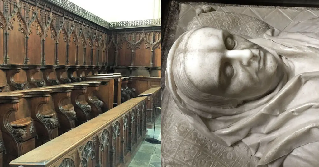 Inside Arundel castle's Fitzalan Chapel, the choir stalls are beautifully carved and the tombs are marble