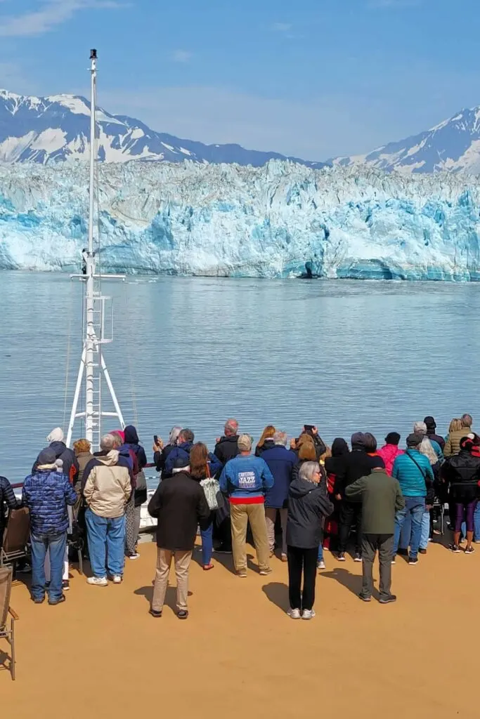 Guests dressed for the cold at Hubbard Glacier in July