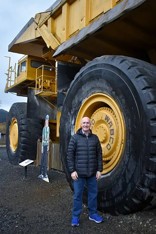 Brian next to a mining truck at Britannia Mine