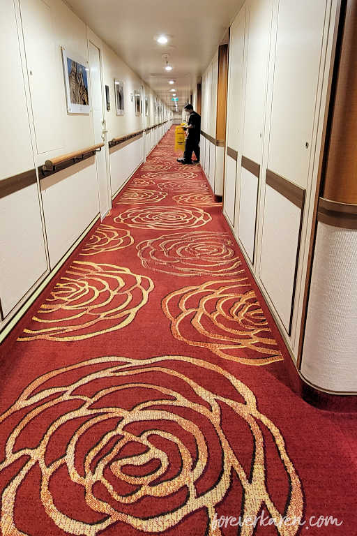 Majestic Princess red carpeted floor on the starboard side