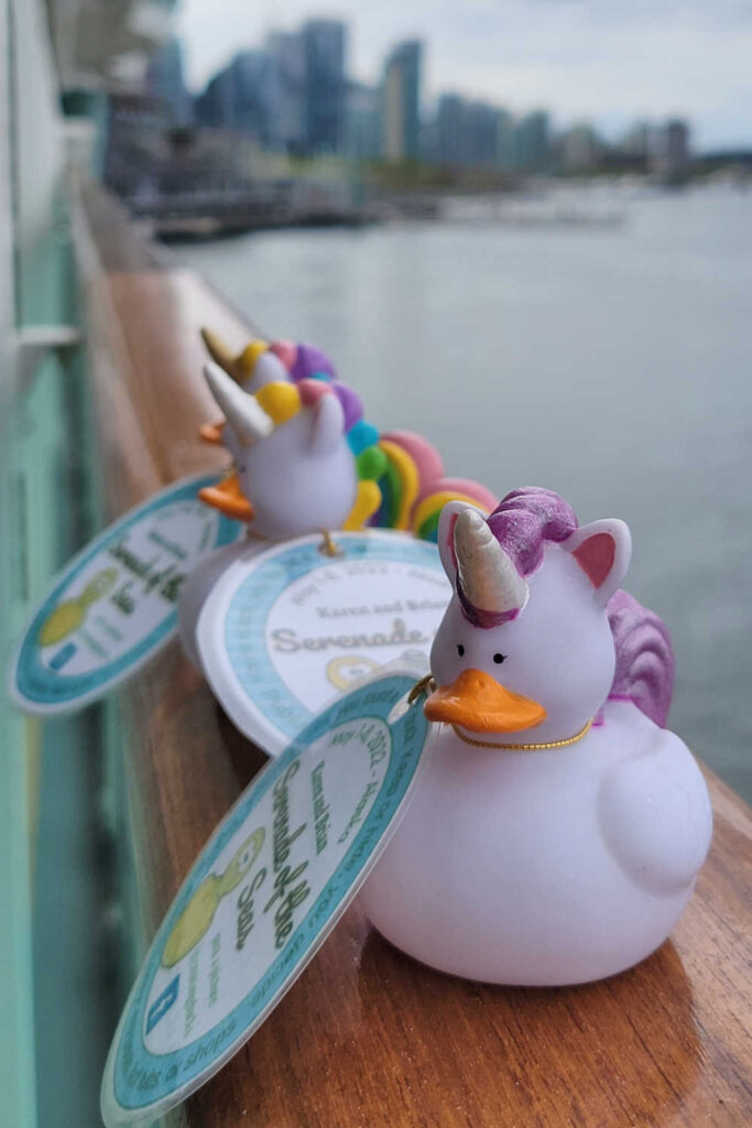Unicorn ducks on a cruise ship railing