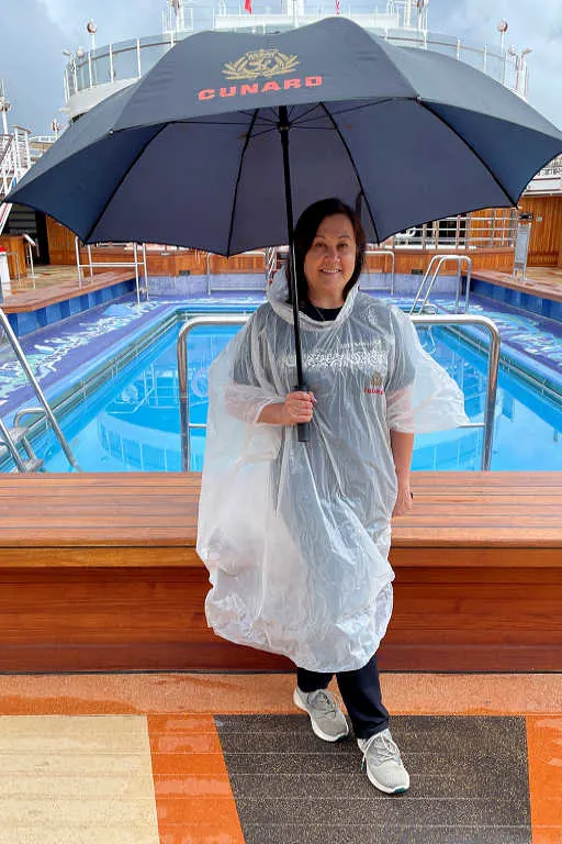 Using the Cunard free umbrella and rain poncho on a rainy day in Ketchikan