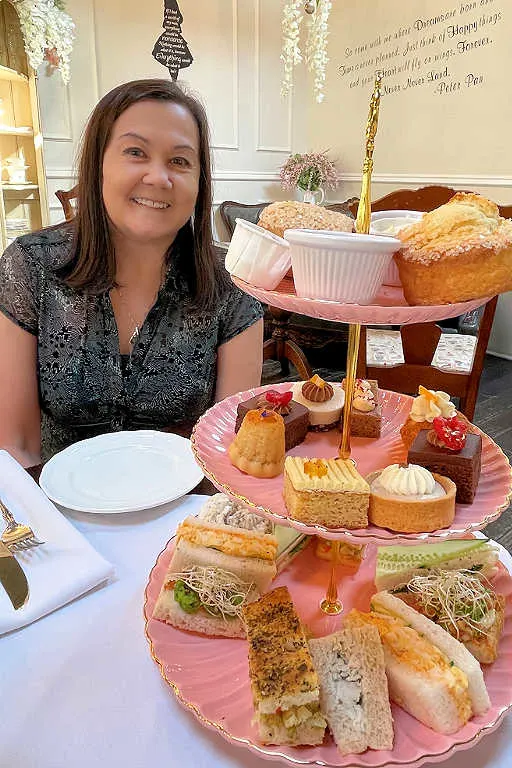 Karen with the tea tower at Neverland