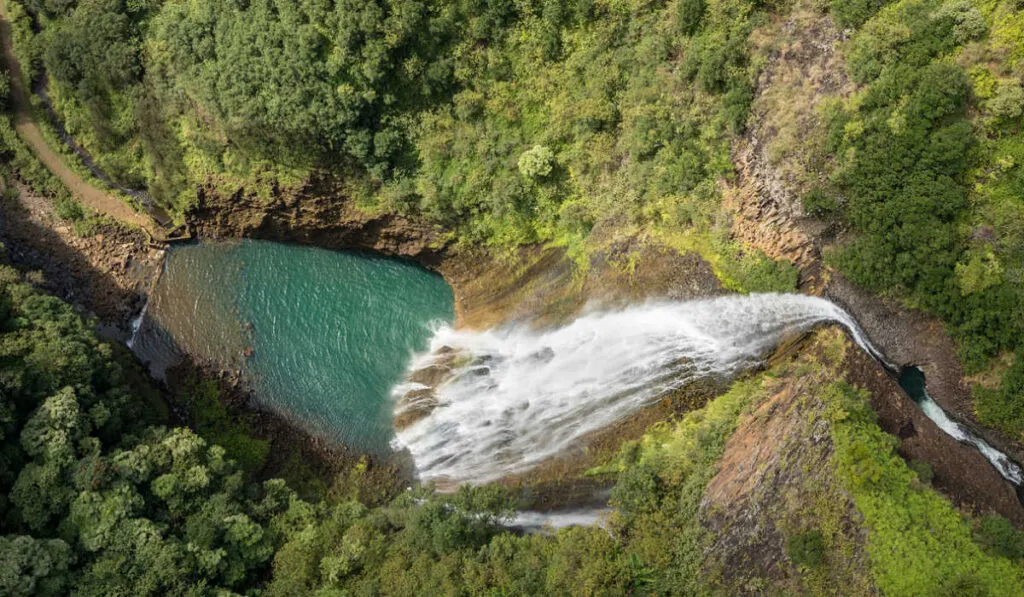 Kauai waterfall seen from a helicopter tour