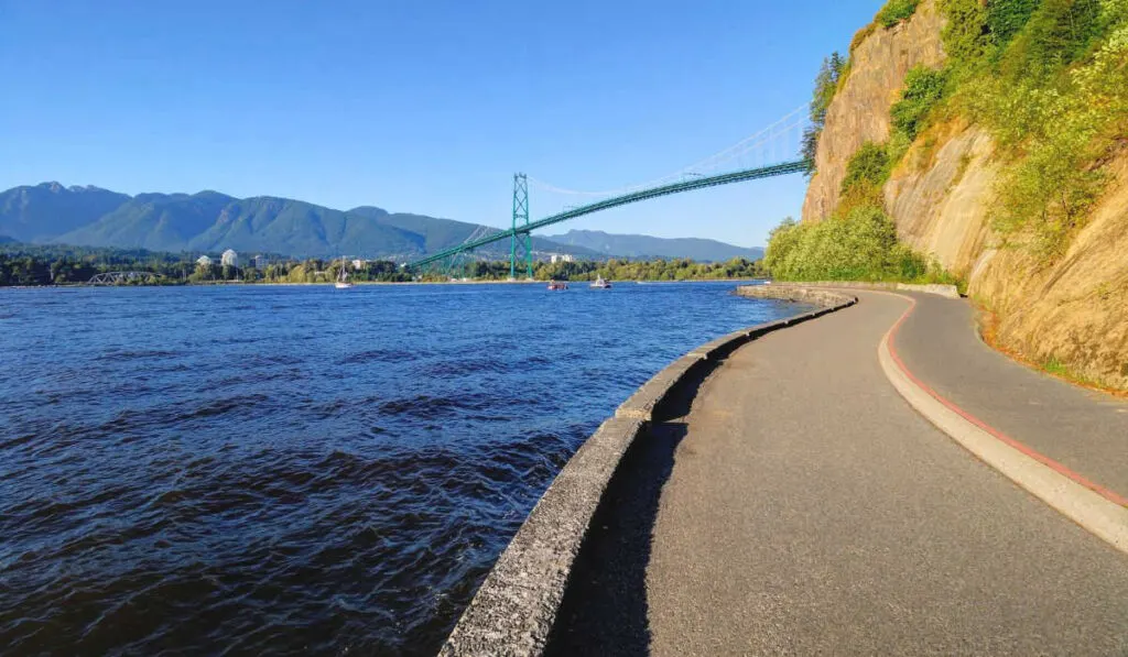 Stanley Park seawall and views of the Lionsgate Bridge and West Vancouver