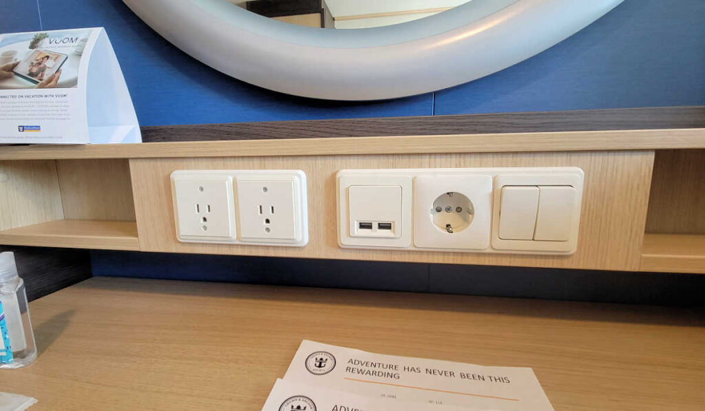 desk plugs in an Ovation of the Seas stateroom