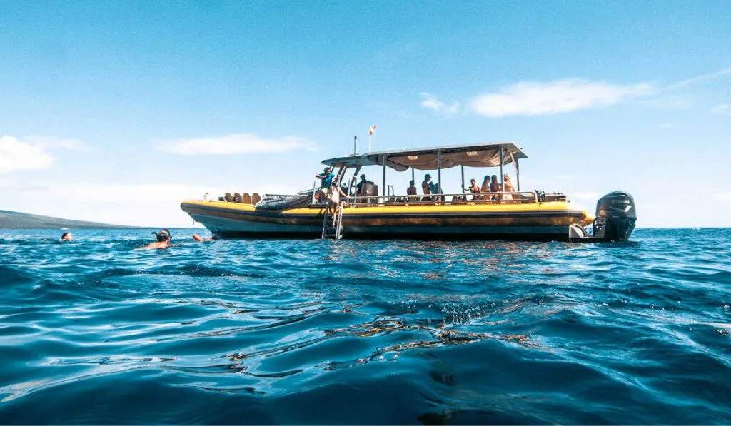 A small boat snorkeling tour at Molokini Crater