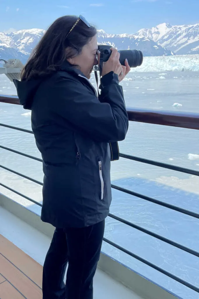 Taking photos at Hubbard Glacier in Alaska