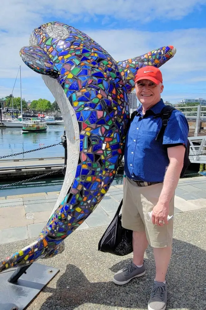 Brian with the mosaic orca in Victoria Harbor