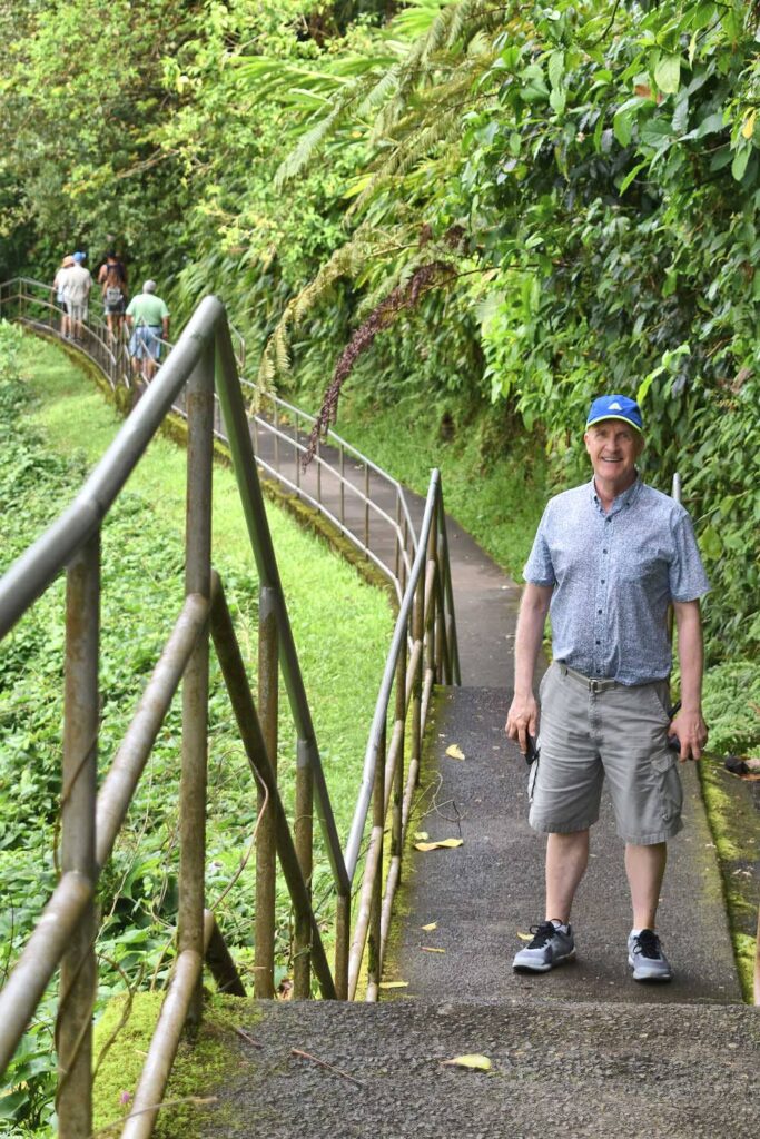 Brian hiking in shorts and runners at Akaka Falls