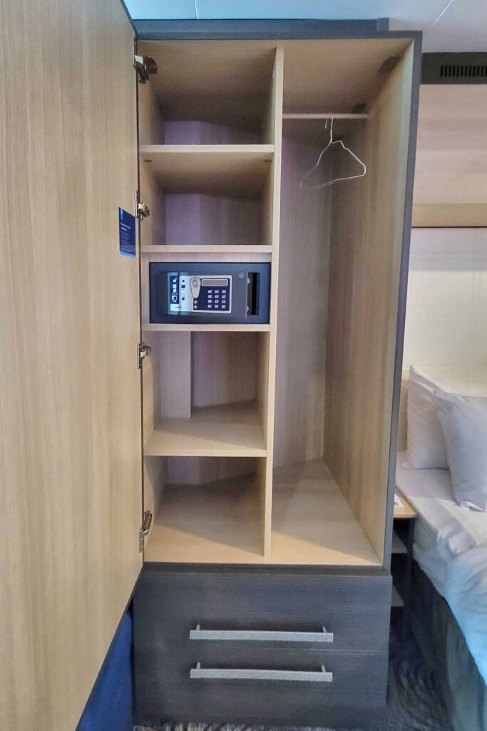 Small stateroom closet with safe