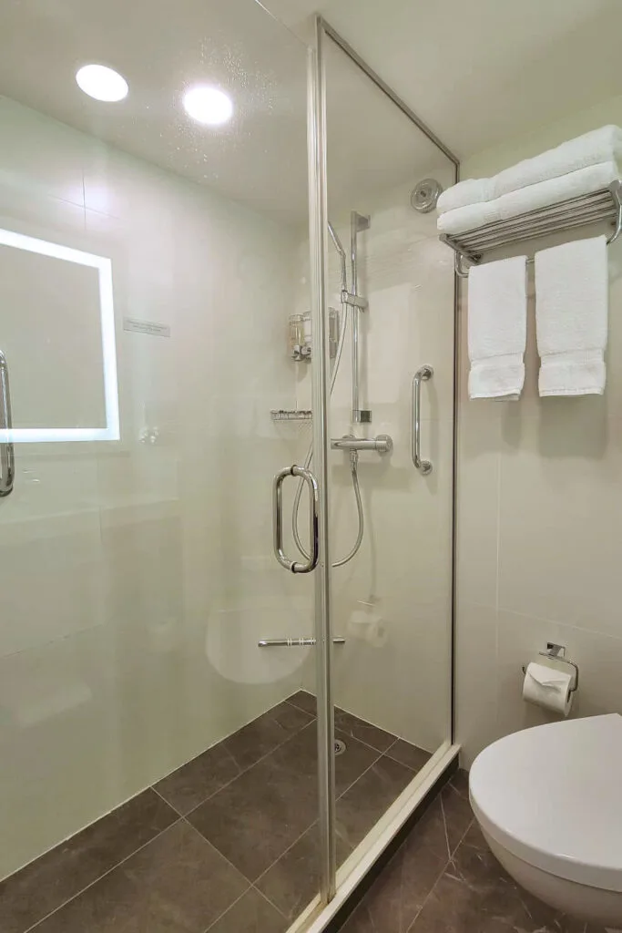 large shower with glass doors on the Holland America Koningsdam